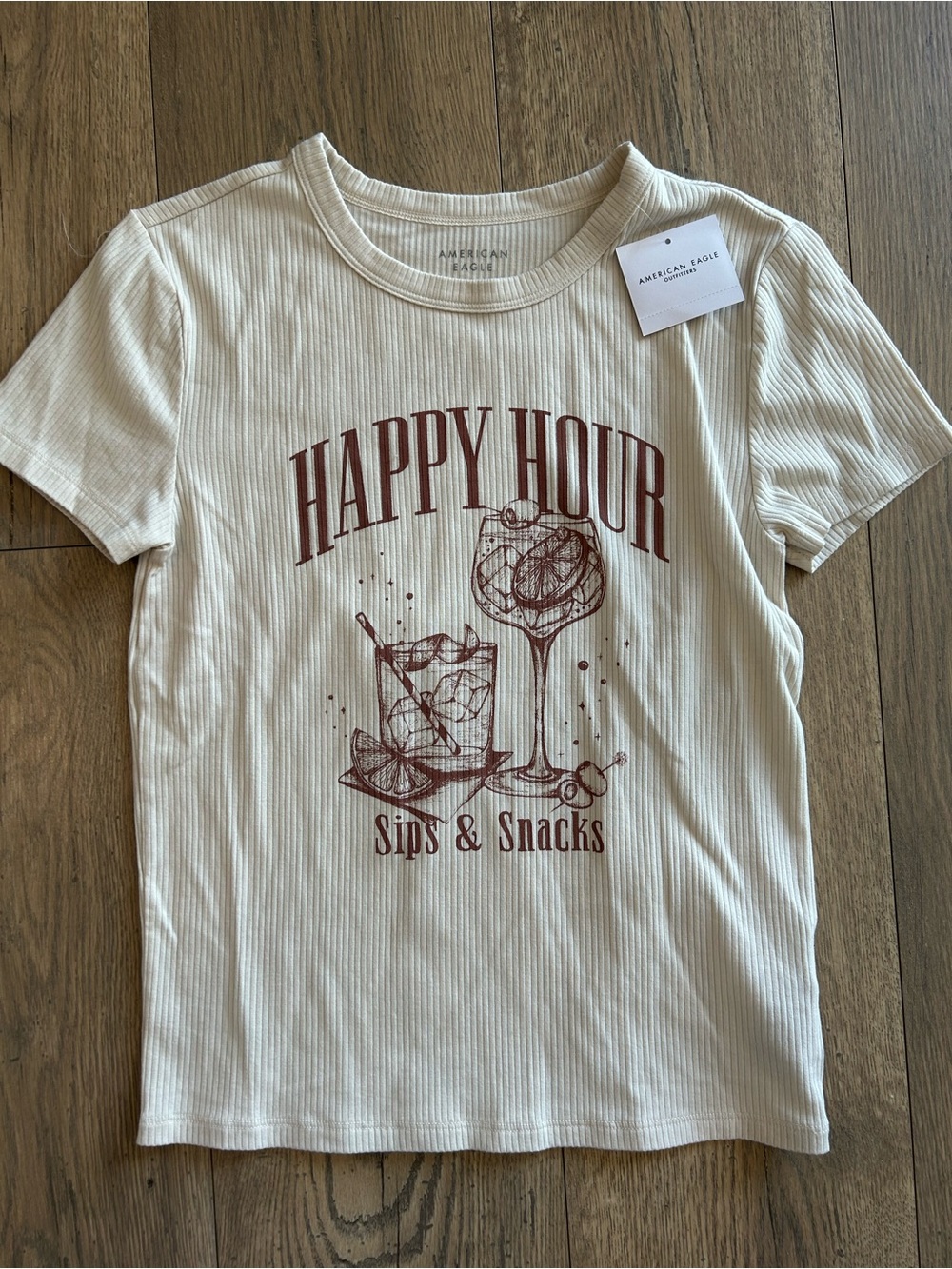 American Eagle Outfitters Cream Ribbed Tee with Brown 'Happy Hour' Graphic
